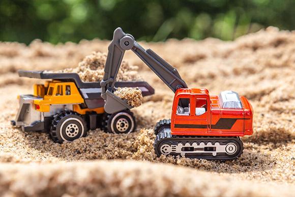 two diggers in sandpit